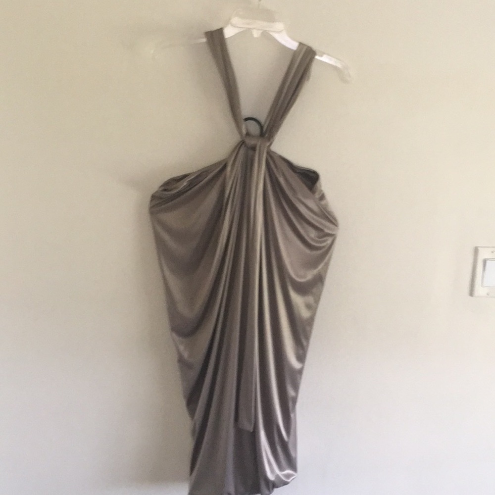 Slinky gold party dress, dramatic neckline